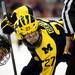 Michigan sophomore left wingman Alex Guptill takes a face-off in the game against Michigan Tech at Joe Louis Arena on Saturday, Dec. 29. Daniel Brenner I AnnArbor.com